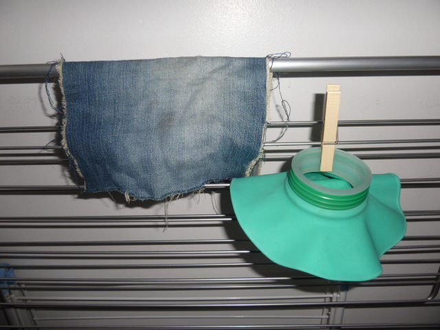 Photo of a ice bag hanged with a clothes pin to be dried. Ice bag is used in Gardelle treatment method or to treat headaches as well.